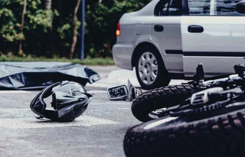 car and motor collision on accident prone road