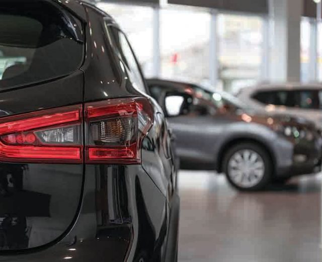 car dealership close up shot on a new car