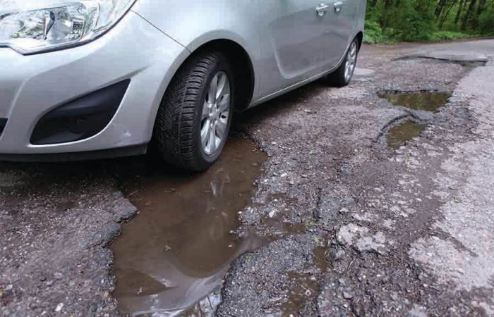 test driving the car's ride comfort on bumpy road
