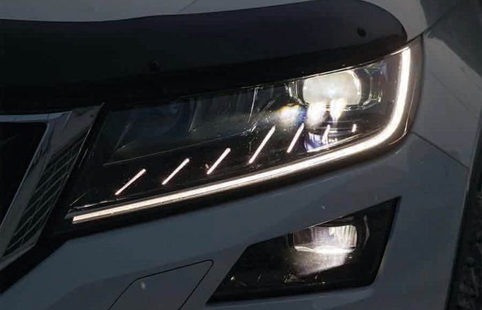 white car with aftermarket daytime running light
