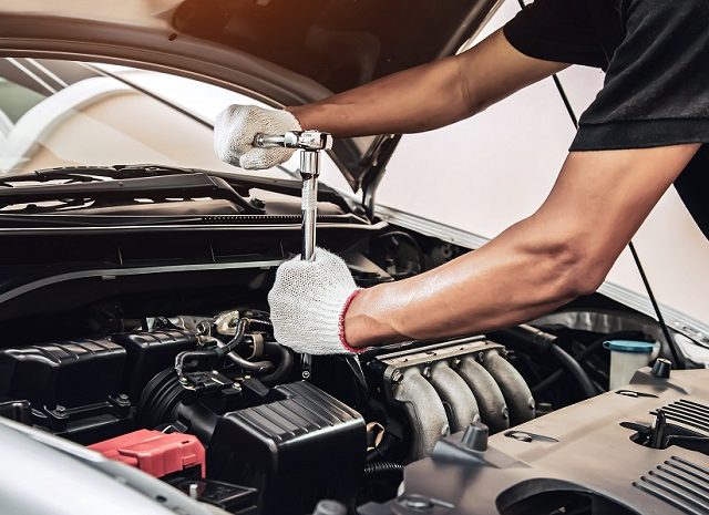 mechanic doing car tuning
