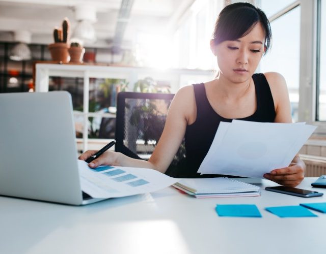 lady researching on PARF rebate and COE rebate