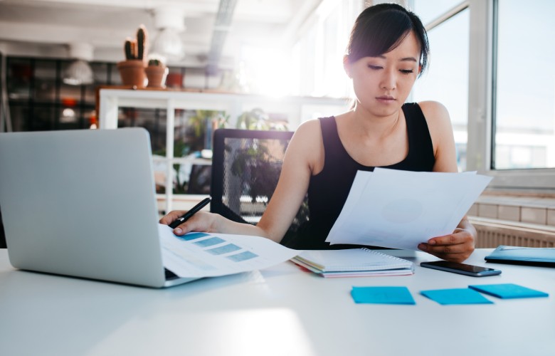 lady researching on PARF rebate and COE rebate
