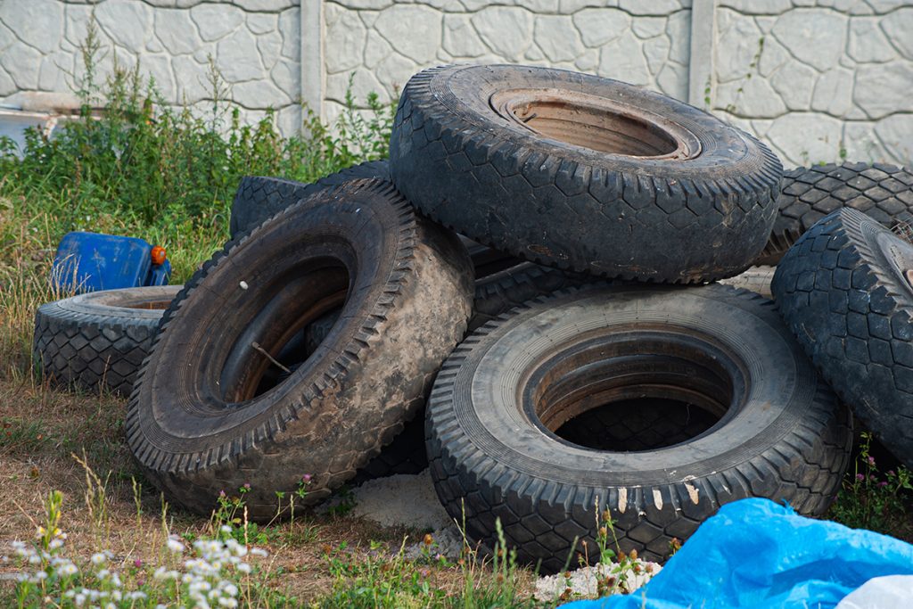 Old tires in a car scrapyard in Singapore