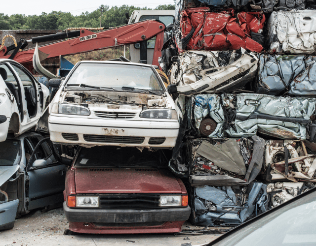 Baled scrap cars in depot for old cars