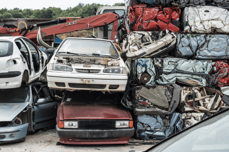 Baled scrap cars in depot for old cars